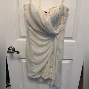 Strapless white draped dress